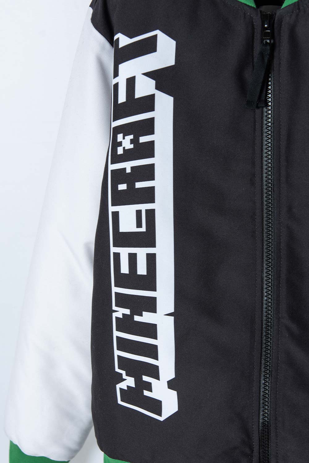 CHAQUETA DE MINECRAFT MARFIL Y NEGRA ESTAMPADA EN FRENTE PARA NIÑO
