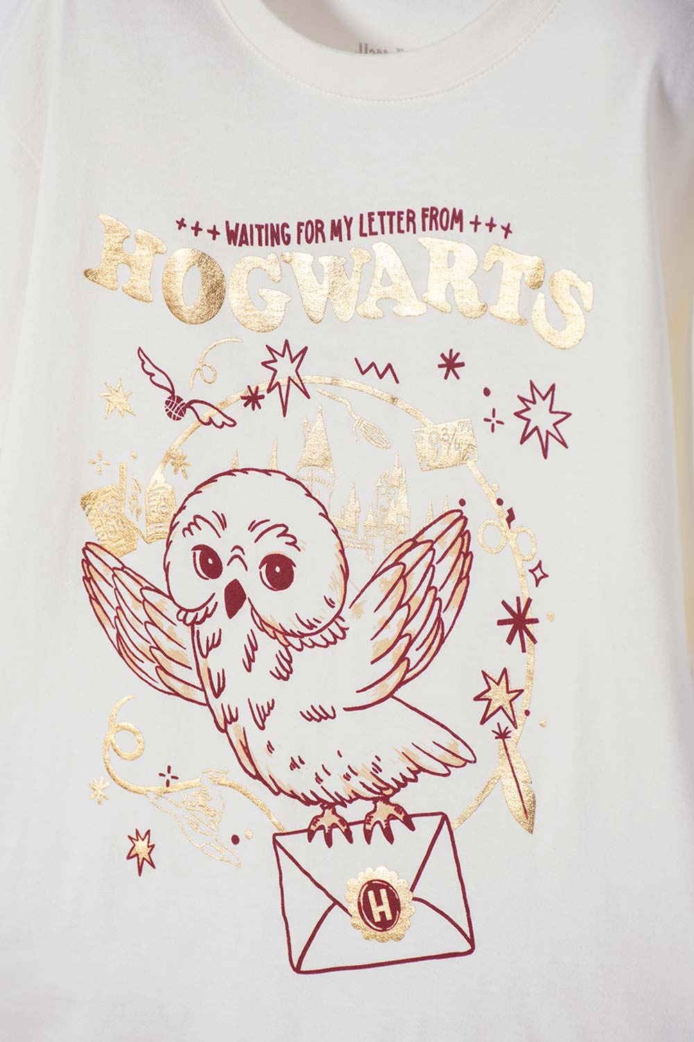 CAMISETA DE HARRY POTTER MANGA LARGA MARFIL PARA NIÑA