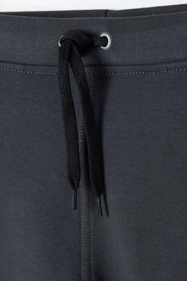 JOGGER DE MIC CON CORDÓN GRIS PARA NIÑO